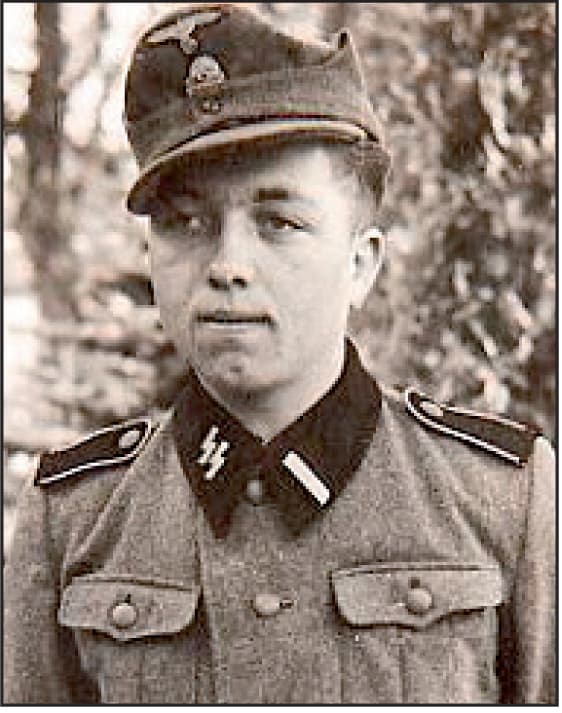 Black-and-white wartime portrait of Heinrich Steinmeyer as a young soldier