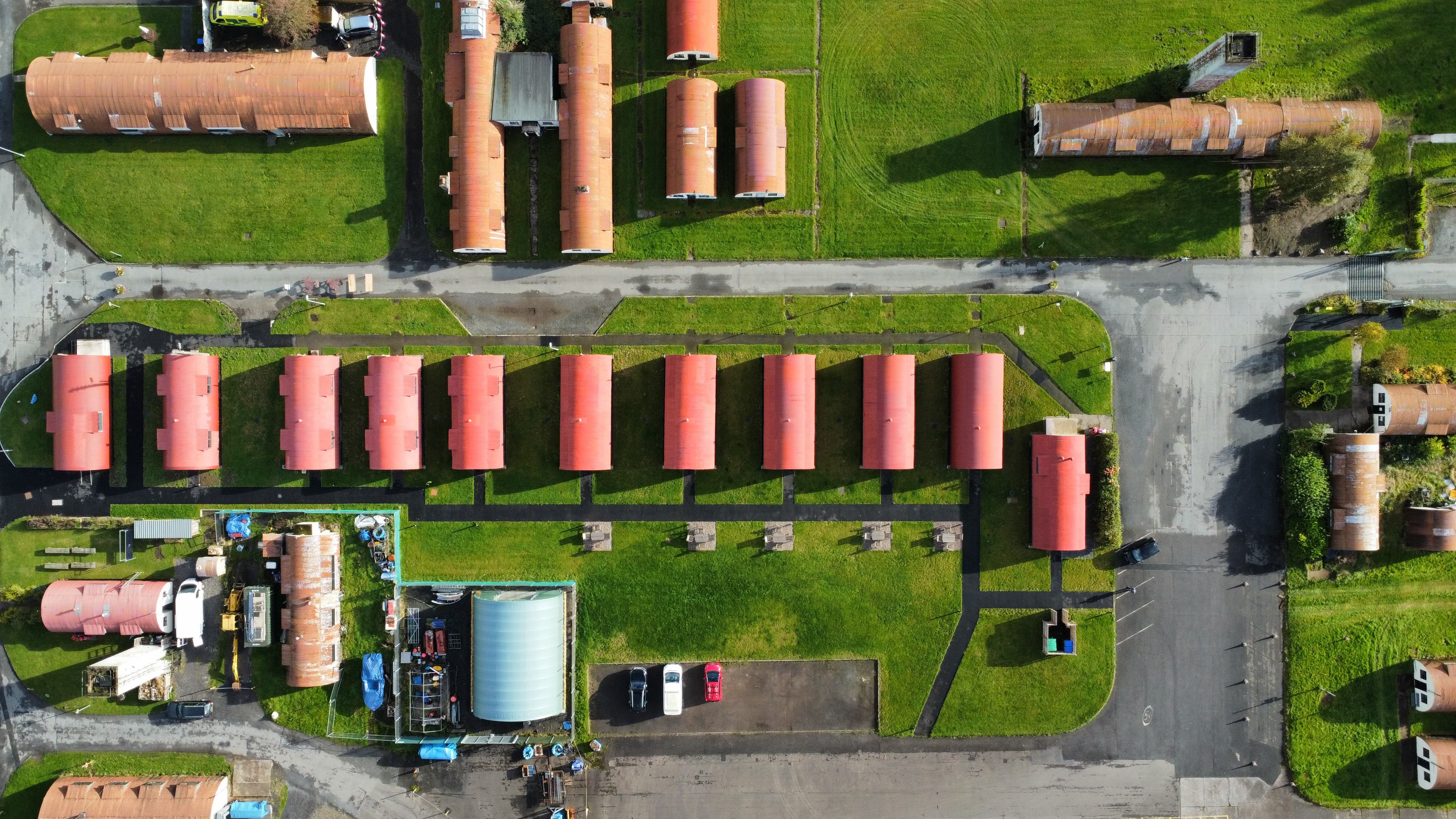 Aerial view of officers' avenue at Cultybraggan Camp, showing the rows of Category A-listed Nissen huts that have stood since 1939