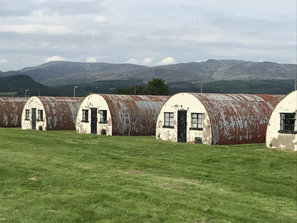 Then — huts against the mountains